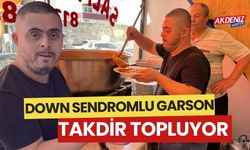 DOWN SENDROMLU GARSON, ÇALIŞIP ANNESİNE BAKIYOR