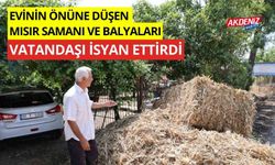 Evinin önüne düşen mısır samanı ve balyaları, vatandaşı isyan ettirdi