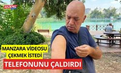 Manzara videosu çekmek istedi, telefonunu çaldırdı