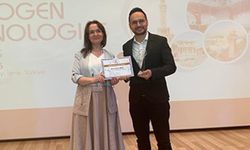OKÜ’den Emin Serhat Akyüz’e Büyük Onur