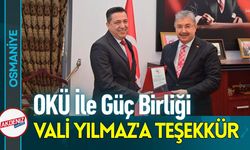 Osmaniye'de OKÜ Rektörü Uzun'dan Vali Yılmaz'a Plaket