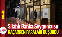 Silahlı Banka Soyguncusu, Kaçarken Paraları Düşürdü!