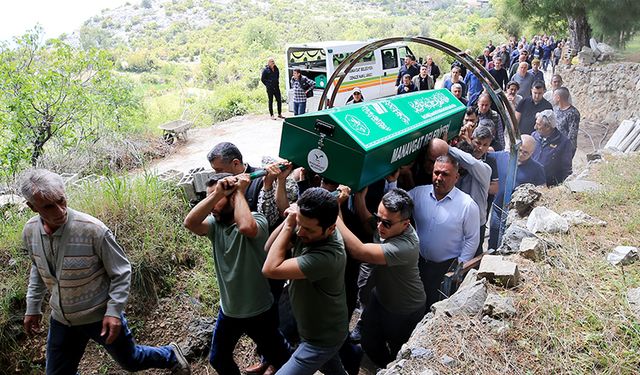 Rusya'da hayatını kaybeden dağcının cenazesi Antalya'da defnedildi