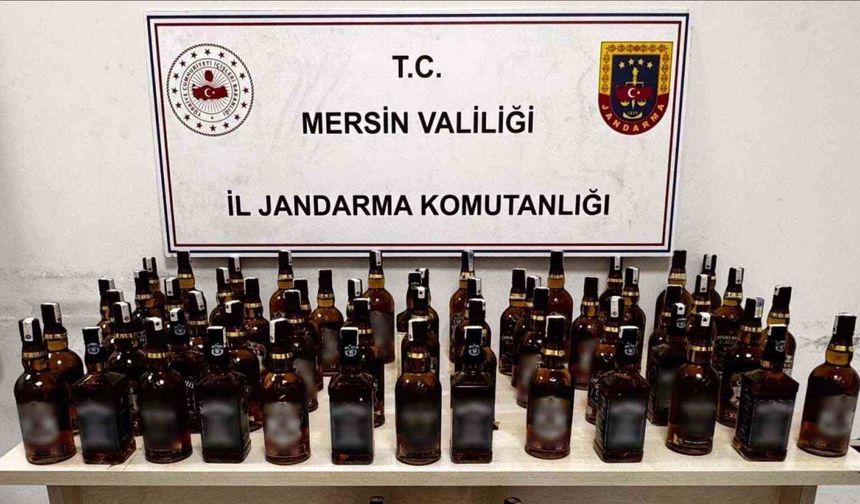 Otomobilden şişe şişe kaçak içki çıktı